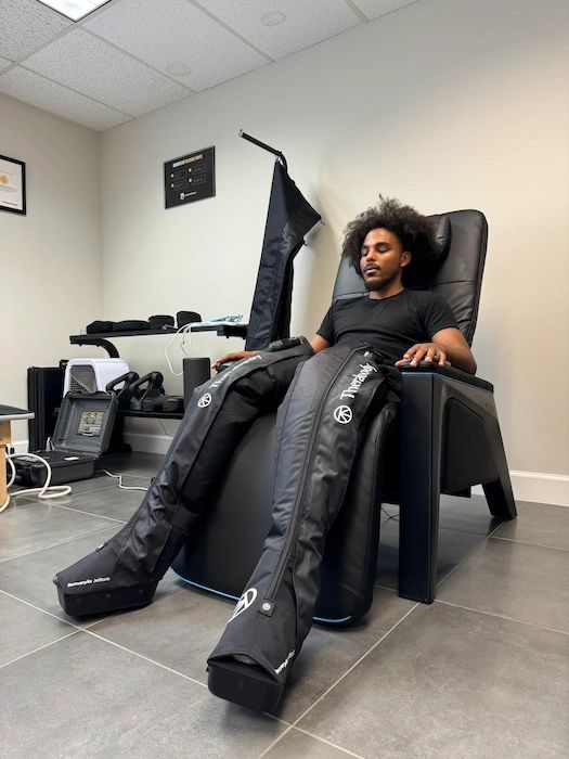 Compression boots therapy at Wellness Elite Fitness in Friendswood, TX