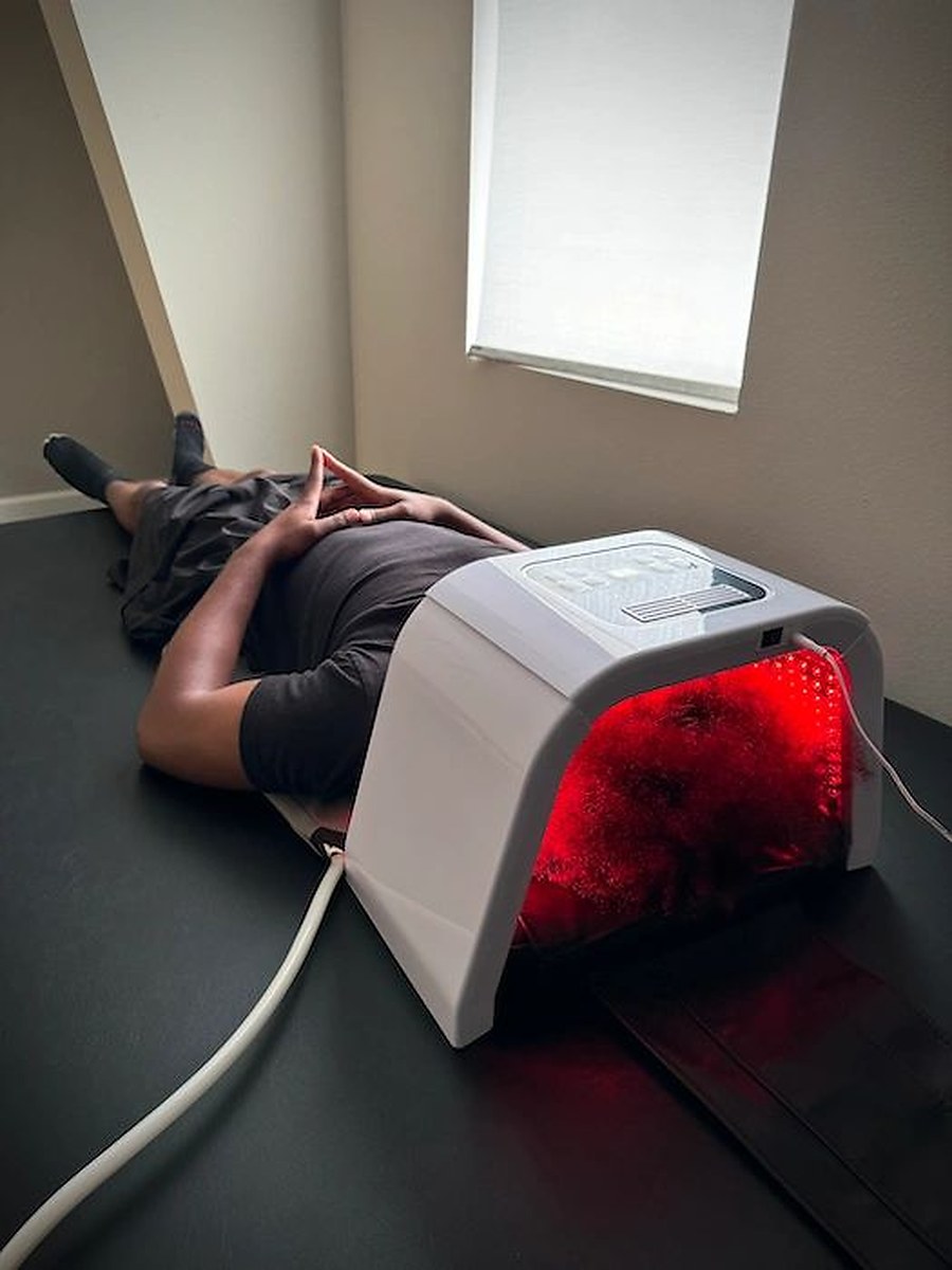 Red light facial therapy at Wellness Elite Fitness in Friendswood, TX